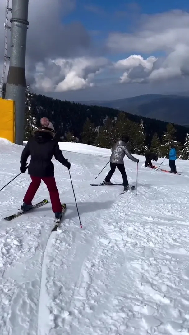 Capture of students enjoying their newly learned skills on the red slope Yastrebets
