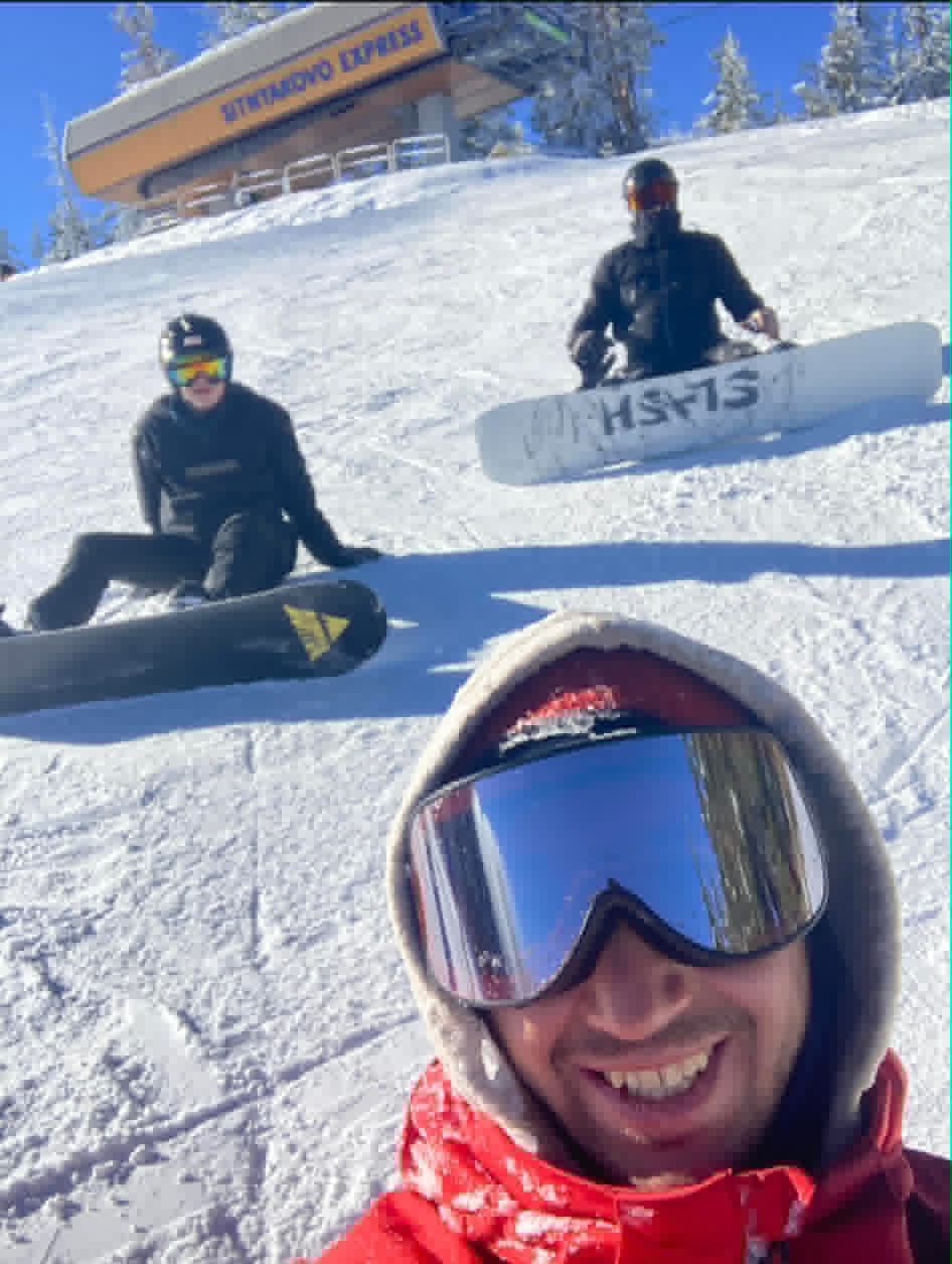 Preparing for a group snowboard lesson on 'Sitnyakovo' slope
