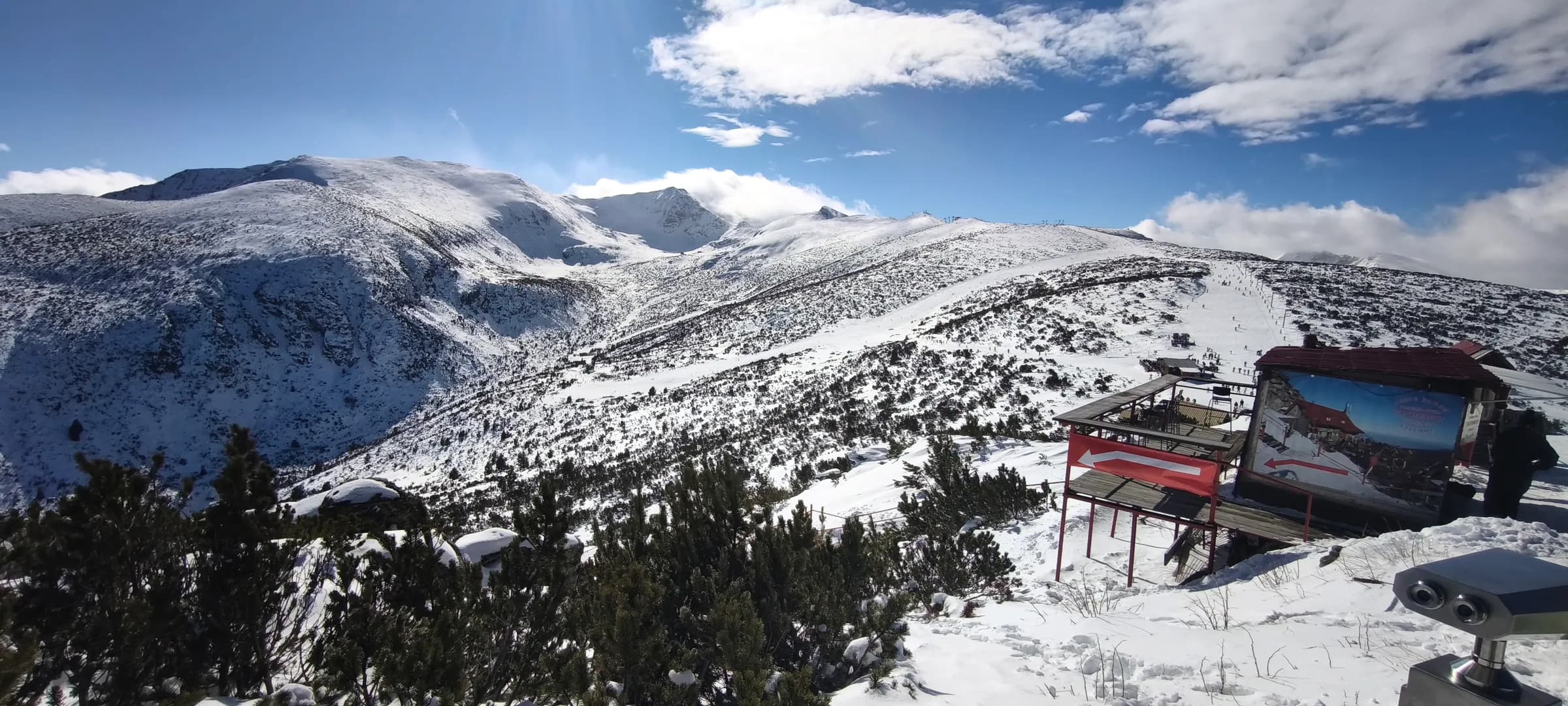 Wind-carved snow along an exposed shoulder